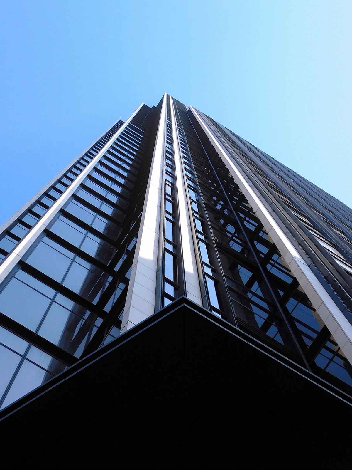Glass facade of a modern high-rise building